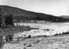 H�r flyter H�lj�n in i Klar�lven. Foto fr�n en av fastigheterna vid Andersstubben. Vattenf�ringen i �n �r exceptionellt l�g, d� sommaren 1955 var mycket torr.
