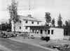 Den nya tullstationen i L�ngflon byggdes s� sent som 1953. Vi ser den h�r fr�n sydv�st med tj�nstemannabost�der intill. Den blivande sj�n kommer att tangera den bortre gaveln p� den senare byggnaden.